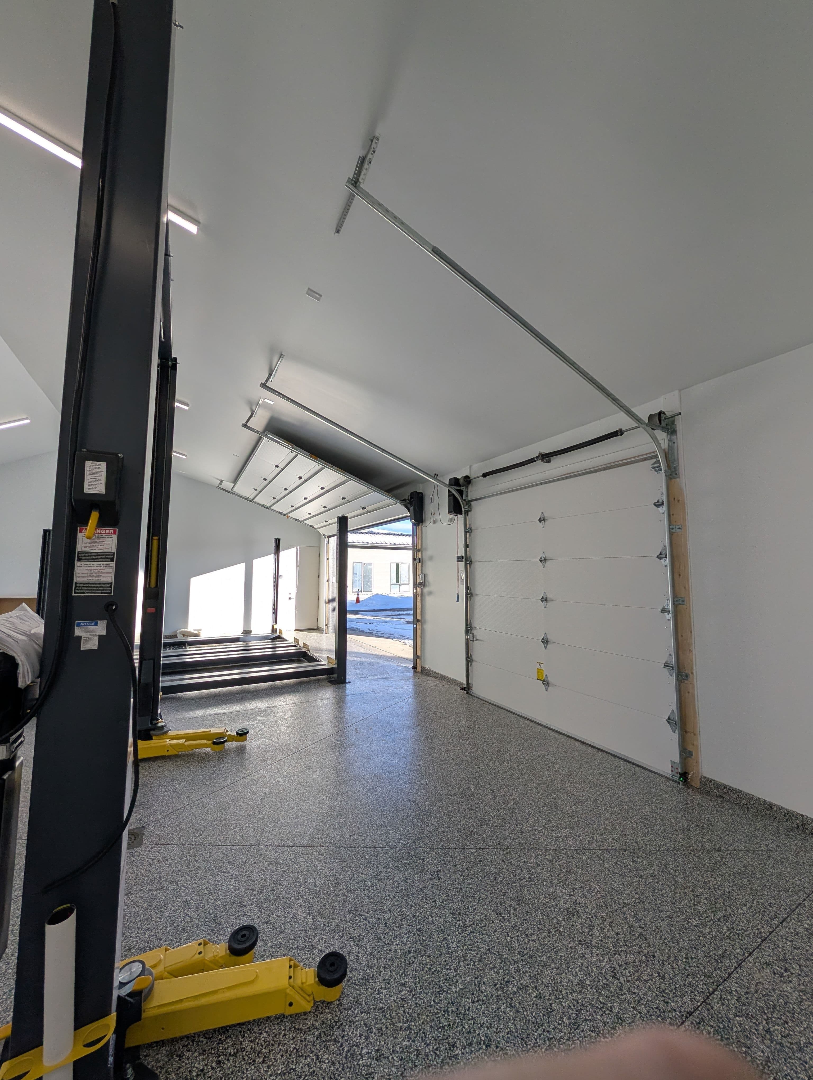 Project Precision Garage Setup with Custom Door Tracks image