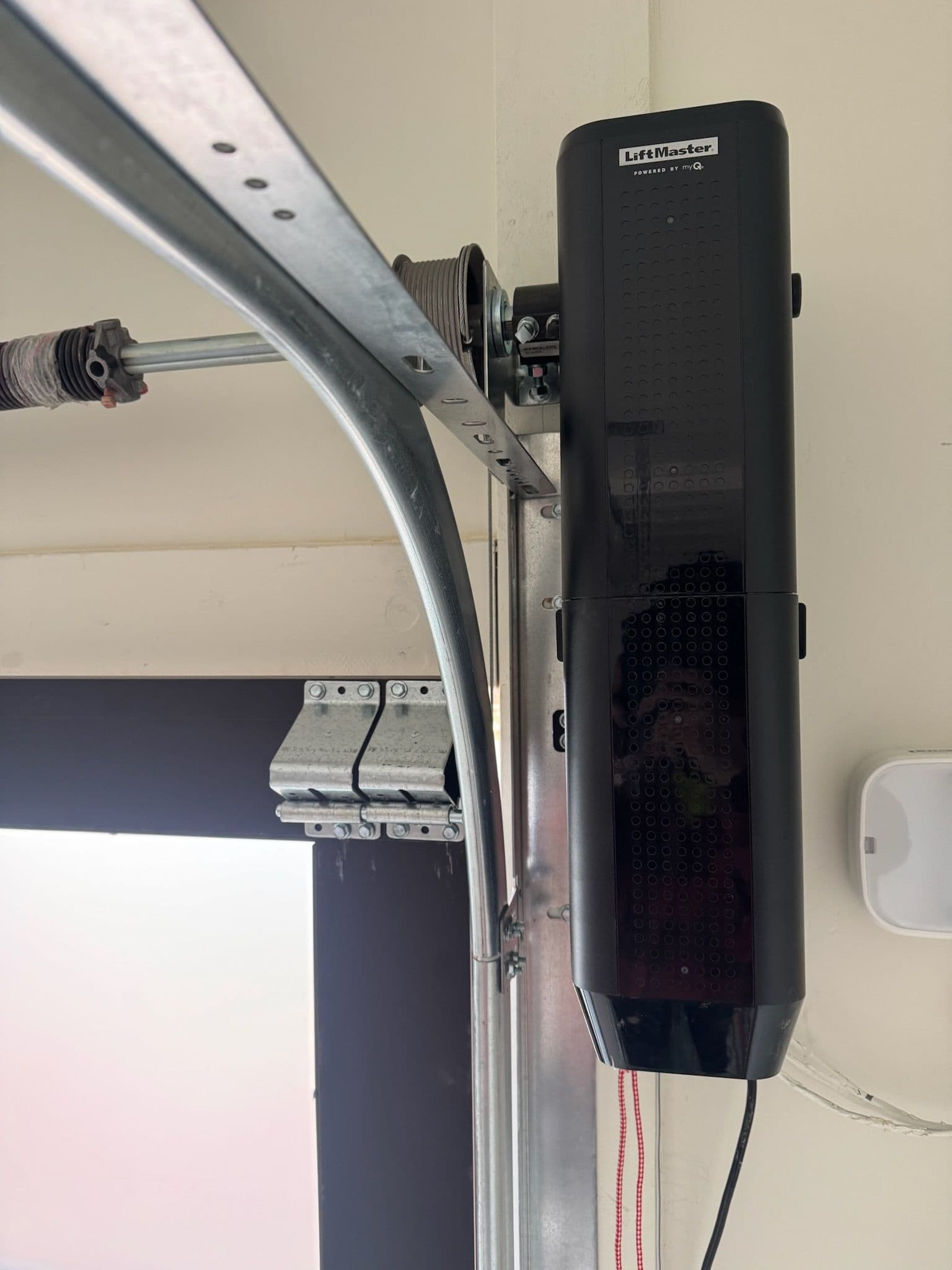 Efficient LiftMaster Installation for Space-Saving Garage image
