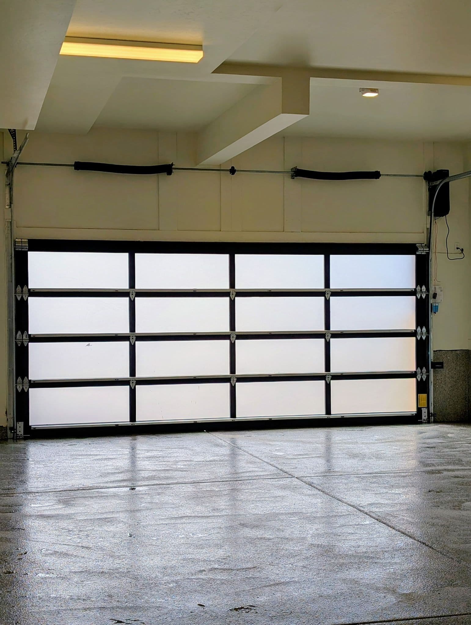 Project Modern Translucent Garage Door Installation in Winter Park image