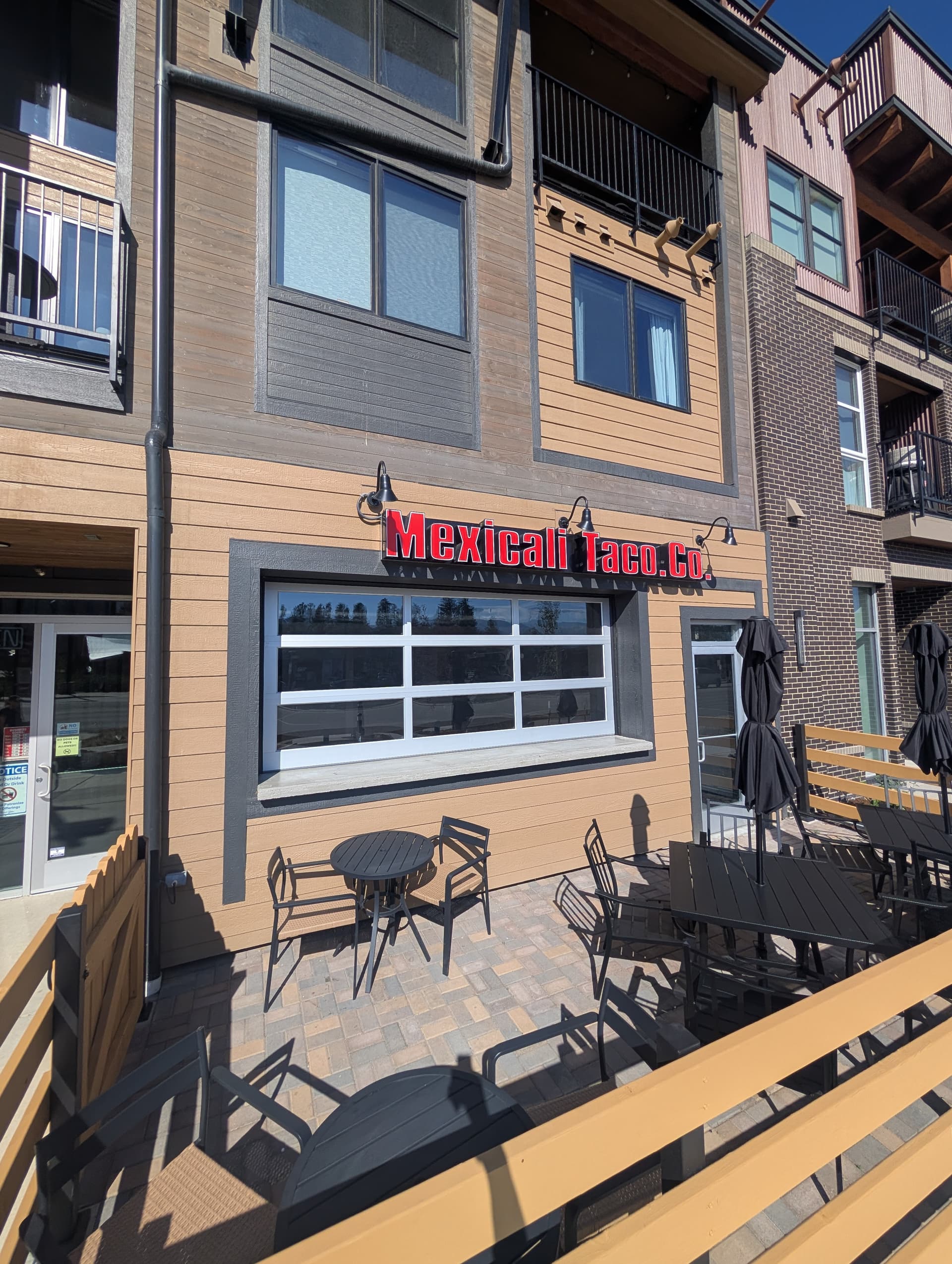 Hormann Full View Garage Door Opens Up Mexicali Taco Co. Patio in Winter Park image